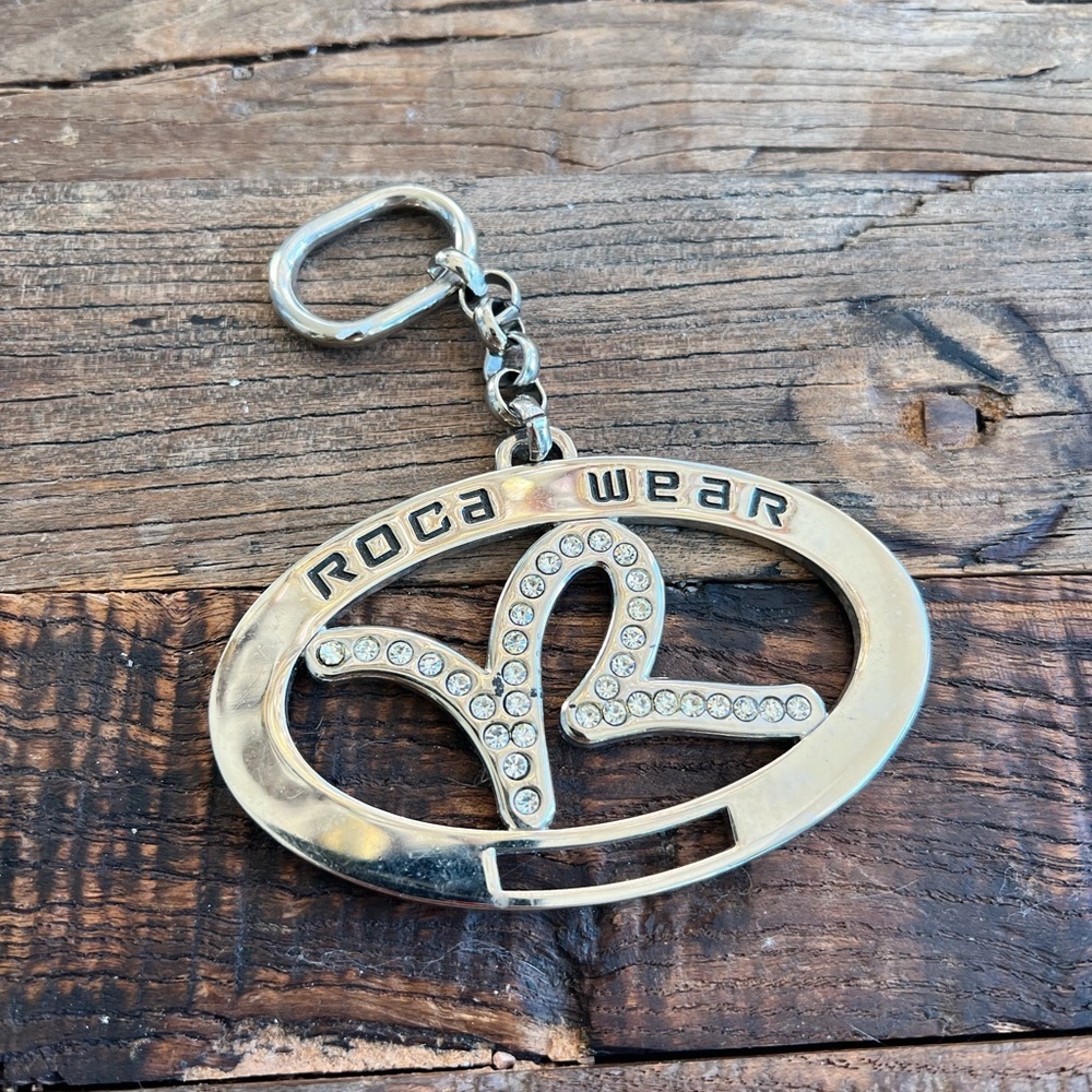 Rocawear logo keychain with clear rhinestones in center